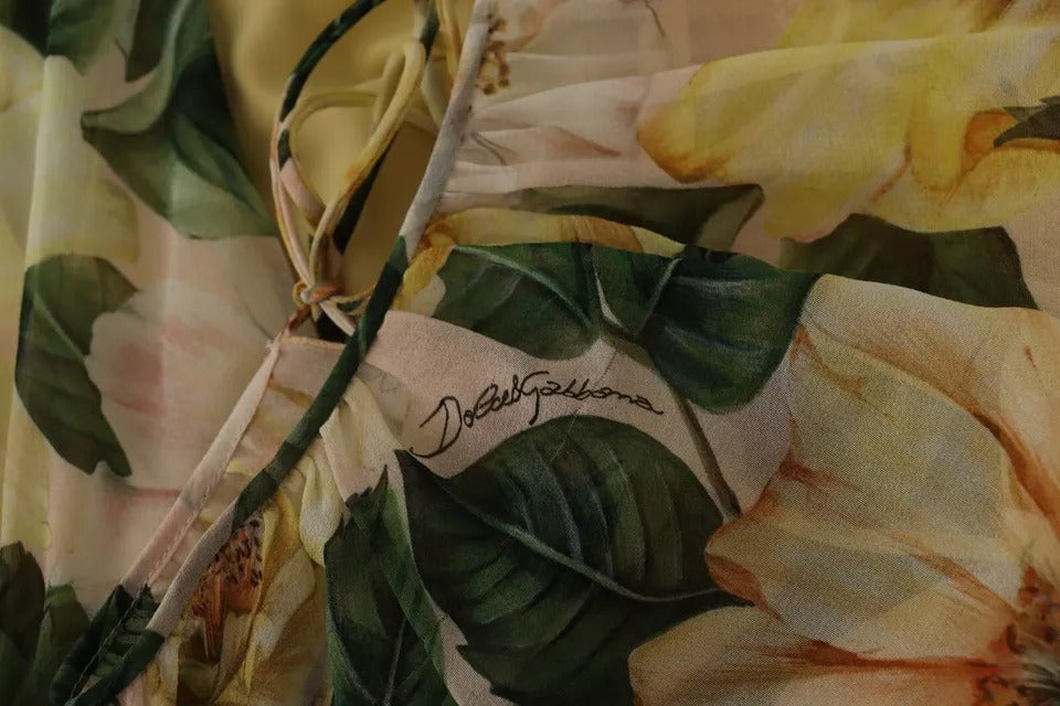Robe longue Dolce & Gabbana en soie multicolore avec imprimé floral, style maxi élégant et fluide.