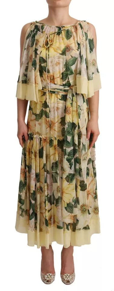 Robe longue en soie multicolore avec imprimé floral Dolce & Gabbana, élégante et fluide, portée par un mannequin.