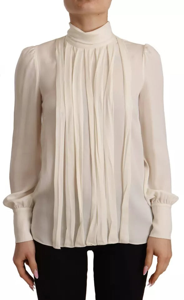 T-shirt à manches longues en soie blanche Dolce & Gabbana avec col roulé, élégant et fluide.