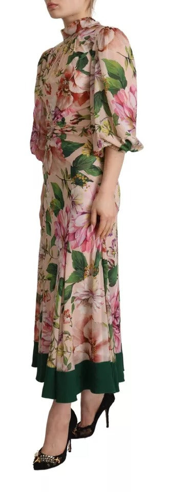 Robe longue Dolce & Gabbana rose à ligne A, coupe fourreau avec motif floral et nœud en pussy bow.
