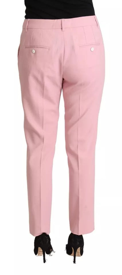 Pantalons en laine rose Dolce & Gabbana, taille moyenne, coupe tapered, vue de face sur un fond neutre.