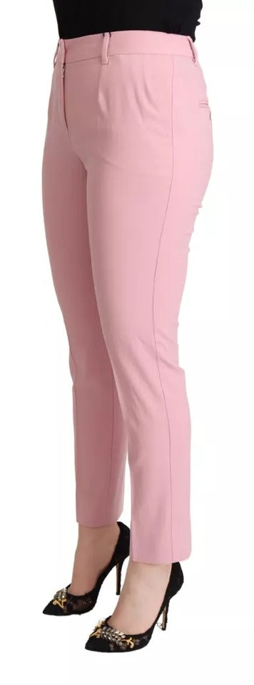 Pantalon en laine rose Dolce & Gabbana taille moyenne, coupe tapered, vue de face sur fond blanc