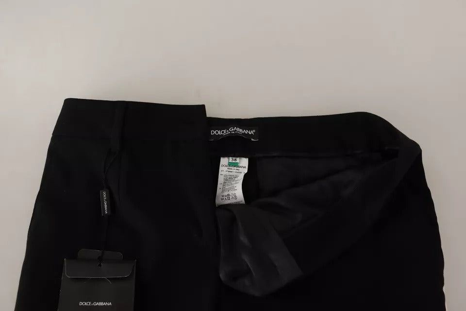 Pantalons en laine à rayures noires et blanches de Dolce & Gabbana, coupe tapered, pour homme ou femme.