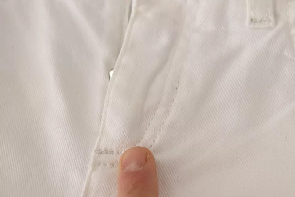Jeans Slim Fit en coton blanc de Dolce & Gabbana, denim élégant avec coupe ajustée pour un style chic et moderne.