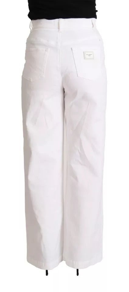 Jeans en denim blanc Dolce & Gabbana Monica avec coupe boot cut, tissu en coton, visibles détails de couture et style moderne.