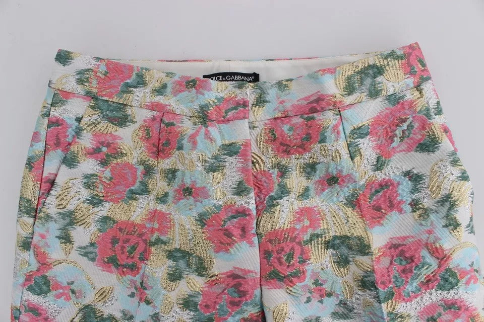 Pantalon en brocart blanc et rose avec motif floral, signé Dolce & Gabbana, pour femme, vue de face.