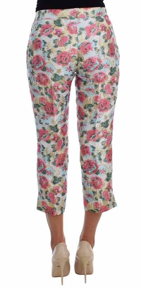 Pantalons en brocart blanc et rose avec motif floral de Dolce & Gabbana, style élégant et sophistiqué.