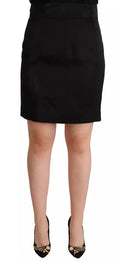 Jupe courte en soie noire Dolce & Gabbana, taille haute, coupe pencil, ajustée, pour un look élégant et sophistiqué.