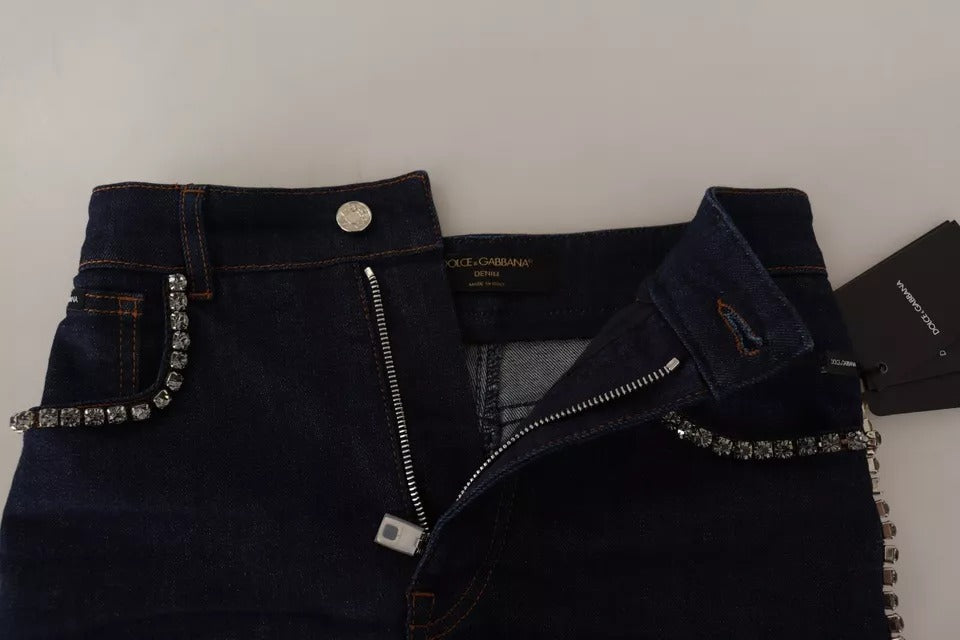Shorts en jean bleu foncé Dolce & Gabbana avec embellissements, style hot pants pour un look tendance et sophistiqué.
