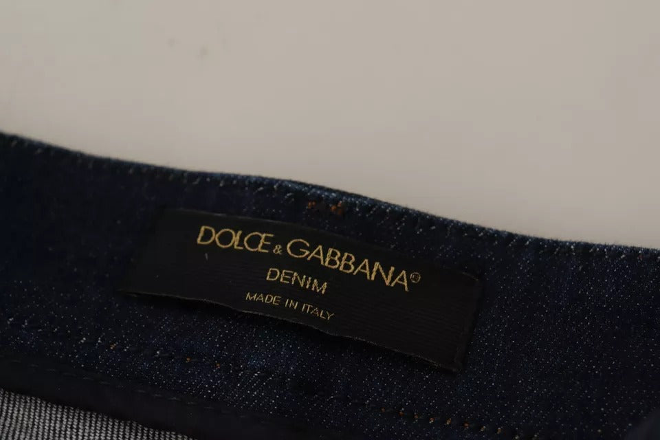Short en jean Dolce & Gabbana bleu foncé avec embellissements, coupe courte et détails élégants.