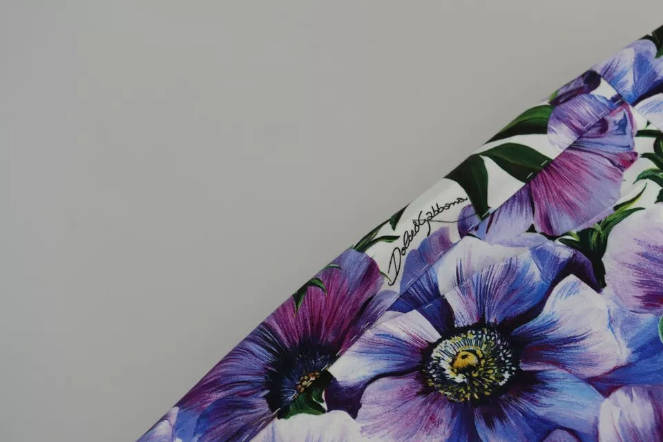 Pantalons en coton violets à imprimé floral Dolce & Gabbana, coupe tapered, vue de face avec détails de la couture.