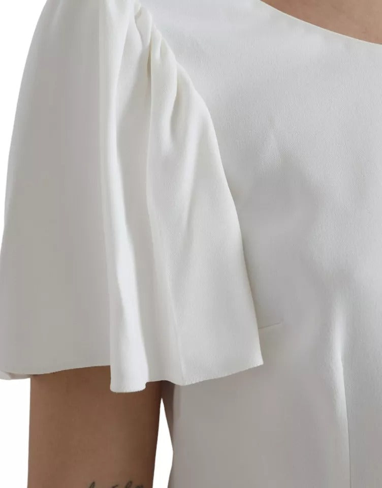 Haut blanc en viscose à col rond et manches courtes de Dolce & Gabbana, élégance moderne et style sophistiqué.