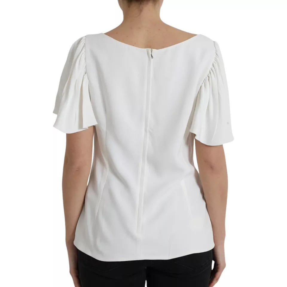 Haut blanc en viscose à col rond et manches courtes de Dolce & Gabbana, tissu léger et élégant.