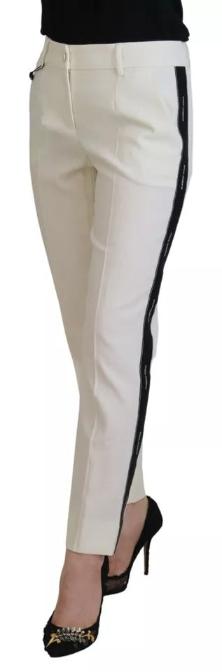 Pantalon blanc en laine à taille haute et coupe tapered de Dolce & Gabbana, vue de face.