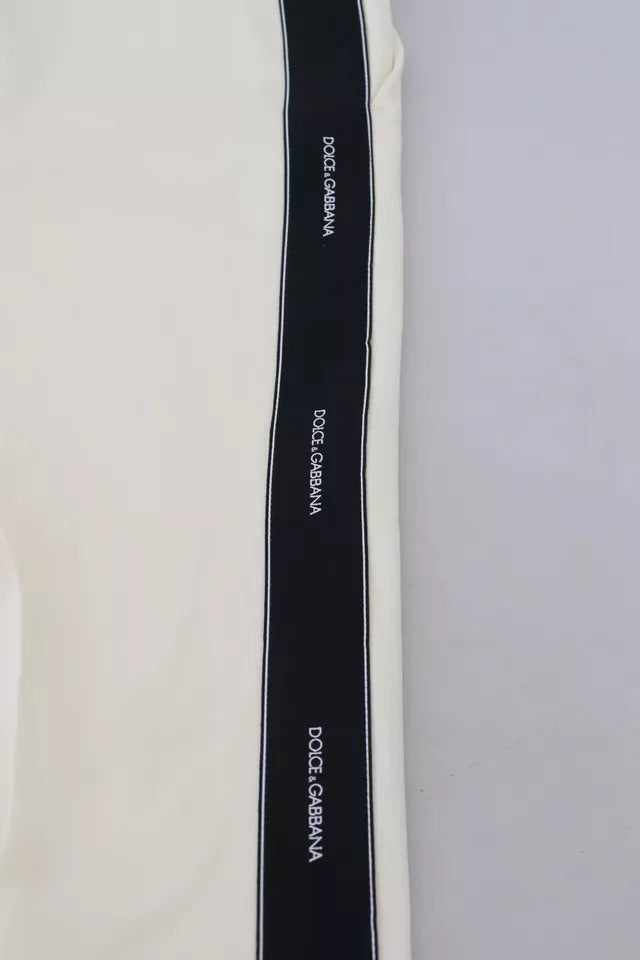 Pantalons en laine blanche à taille haute et coupe tapered de Dolce & Gabbana, vue détaillée du produit.