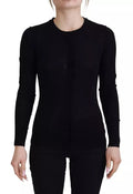 Pull noir à col rond Dolce & Gabbana, manches longues, pullover en laine élégant et classique, porté sur un mannequin.