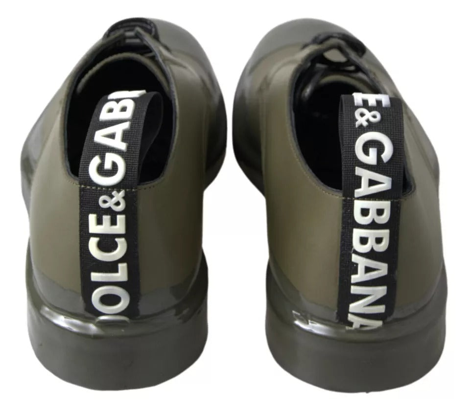 Chaussures habillées en cuir vert avec semelle en caoutchouc de Dolce & Gabbana, style élégant et moderne.