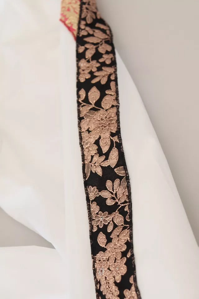 Pantalons Dolce & Gabbana en jacquard blanc en coton mélangé à taille moyenne, vue de face.