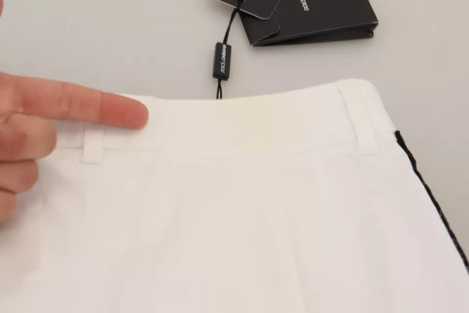 Pantalons Dolce & Gabbana en jacquard blanc, en coton mélangé, taille moyenne, avec coupe élégante et détails sophistiqués.