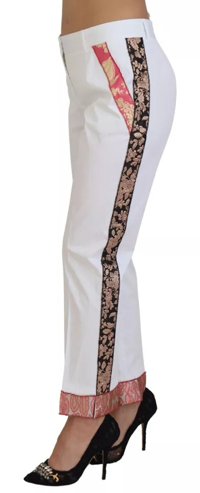 Pantalons en coton jacquard blanc Dolce & Gabbana, taille mi-hauteur, élégants et sophistiqués, visibles en gros plan.