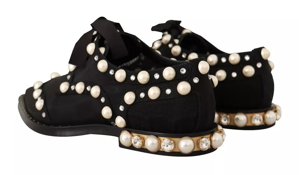 Chaussures plates noires Dolce & Gabbana avec laçage et détails en bijoux, chaussures formelles élégantes et sophistiquées.