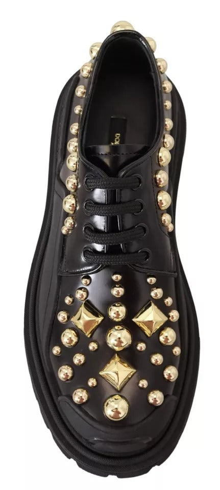 Chaussures Derby en cuir noir Dolce & Gabbana, baskets de trekking ornées de détails élégants, vue de face.