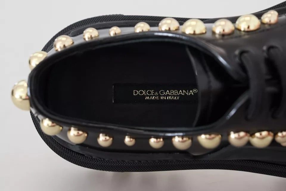 Chaussures de trekking Derby en cuir noir Dolce & Gabbana avec embellissements, style élégant et robuste.