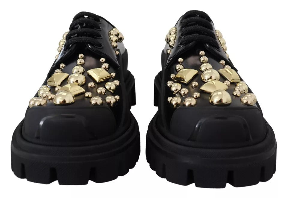 Chaussures Derby en cuir noir Dolce & Gabbana, baskets de trekking élégantes avec ornements, vue de face.