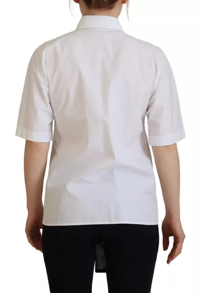 Chemise blanche en coton à manches courtes de Dolce & Gabbana avec boutons sur le devant, vue de face.
