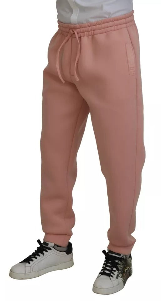 Pantalons joggers en polyester rose de Dolce & Gabbana, style décontracté et confortable, vue de devant.