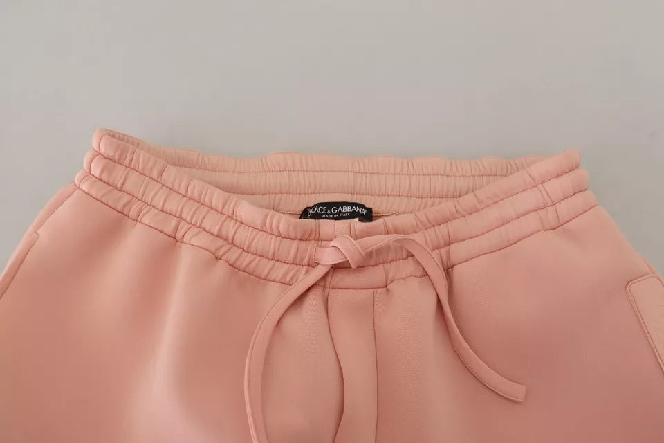 Pantalons de jogging en polyester rose Dolce & Gabbana, coupe décontractée et confortable, pour un style chic et décontracté.