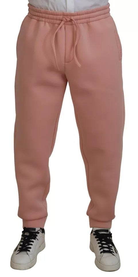 Pantalons de jogging roses en polyester Dolce & Gabbana, style décontracté avec ceinture élastique et poches latérales.