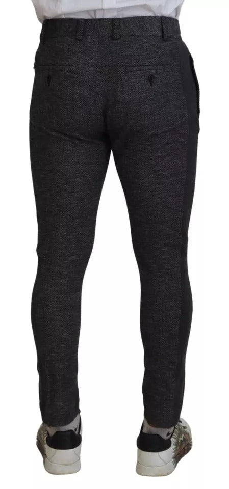 Pantalon skinny en viscose gris à motif chevron de Dolce & Gabbana, coupe ajustée et élégante.