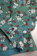 Chemise en denim bleu Dolce & Gabbana avec boutons et motif floral en coton, vue de face.