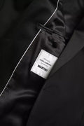 Veste blazer noire en laine à un bouton Dolce & Gabbana, coupe classique, détail à un bouton, style élégant et sophistiqué.
