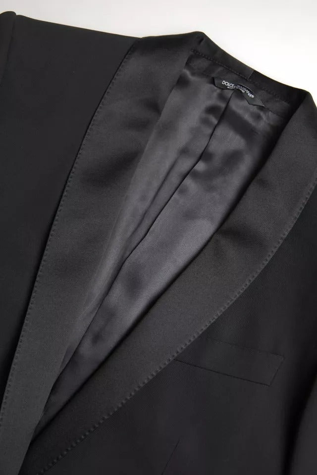 Blazer noir en laine Dolce & Gabbana, coupe single-breasted, veste élégante pour homme.