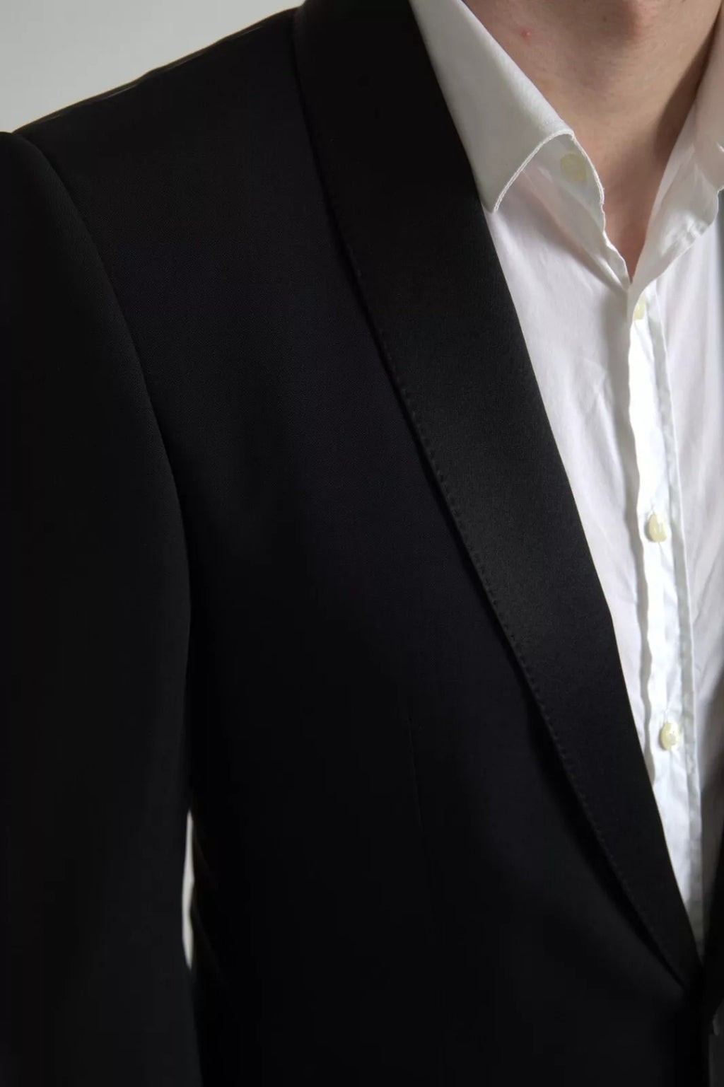 Blazer noir en laine Dolce & Gabbana, à simple boutonnage, élégante veste pour homme ou femme.