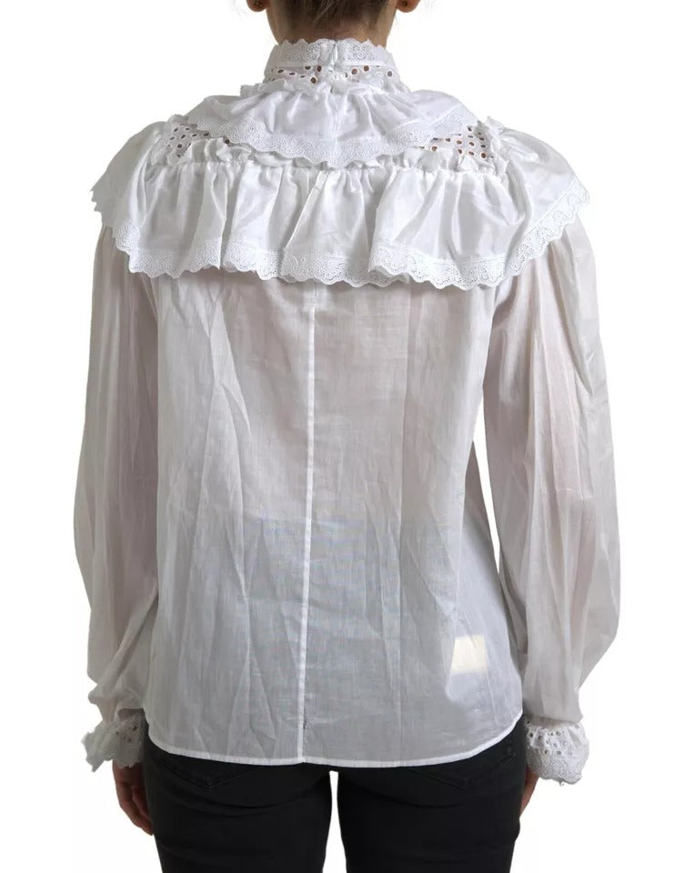 Blouse blanche en coton avec dentelle Dolce & Gabbana à col roulé, style élégant et raffiné.