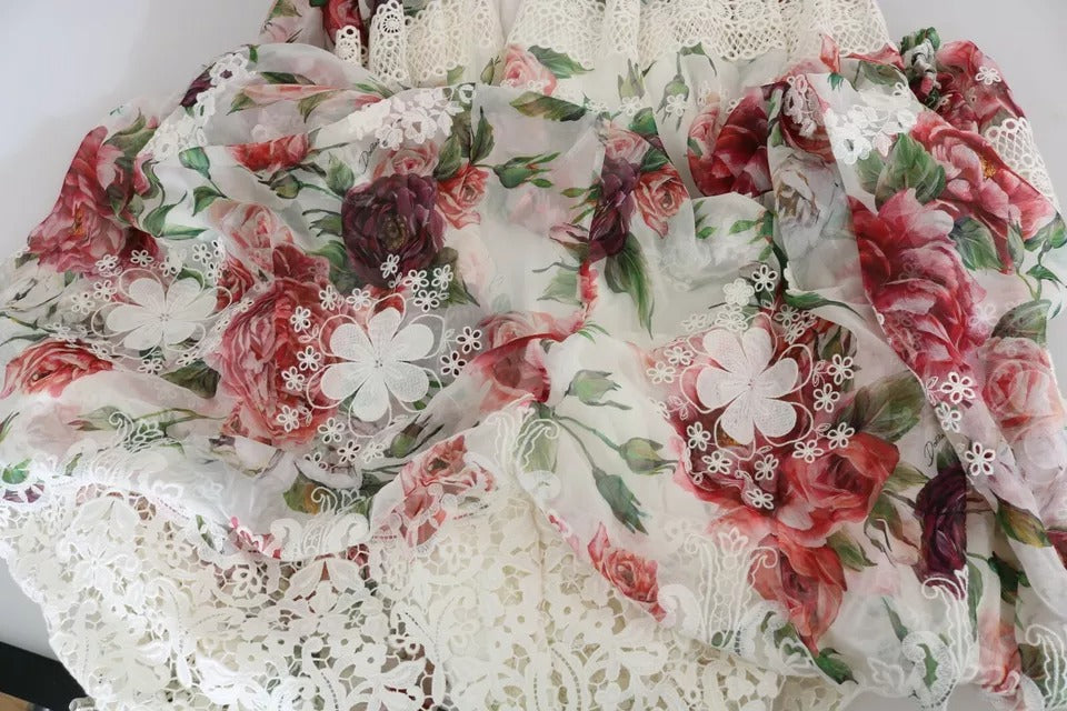 Robe longue à fleurs multicolores Dolce & Gabbana, robe moulante élégante avec motif floral vibrant.