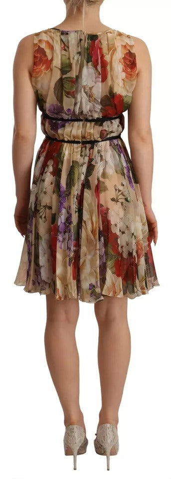 Robe courte beige sans manches avec motifs floraux Dolce & Gabbana, col rond, style élégant et féminin.
