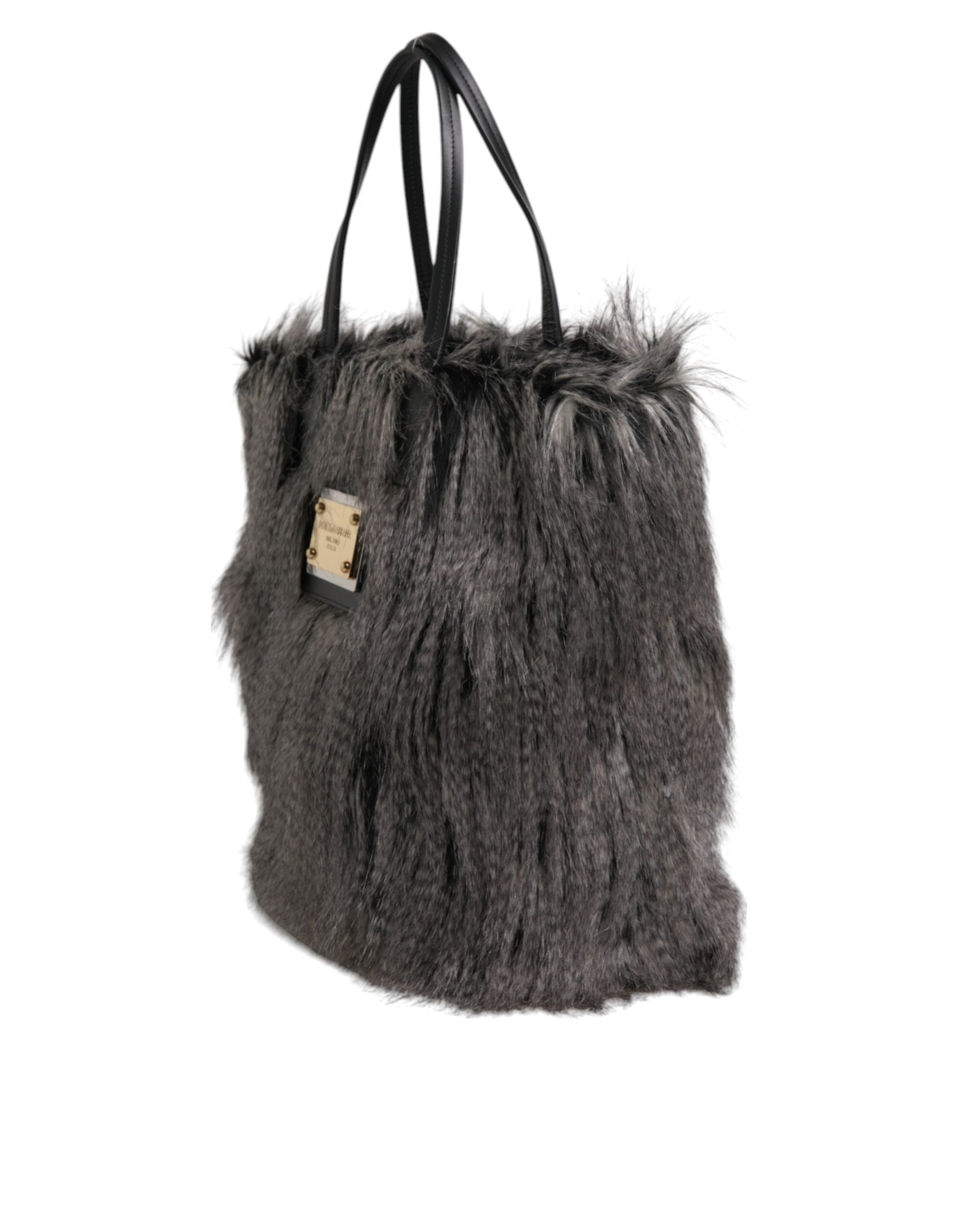 Sac cabas oversize noir en fausse fourrure Dolce & Gabbana, sac shopping élégant avec détails en fourrure synthétique.