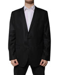 Veste blazer en laine noire à rayures de Dolce & Gabbana, coupe simple et boutonnée, élégance classique.