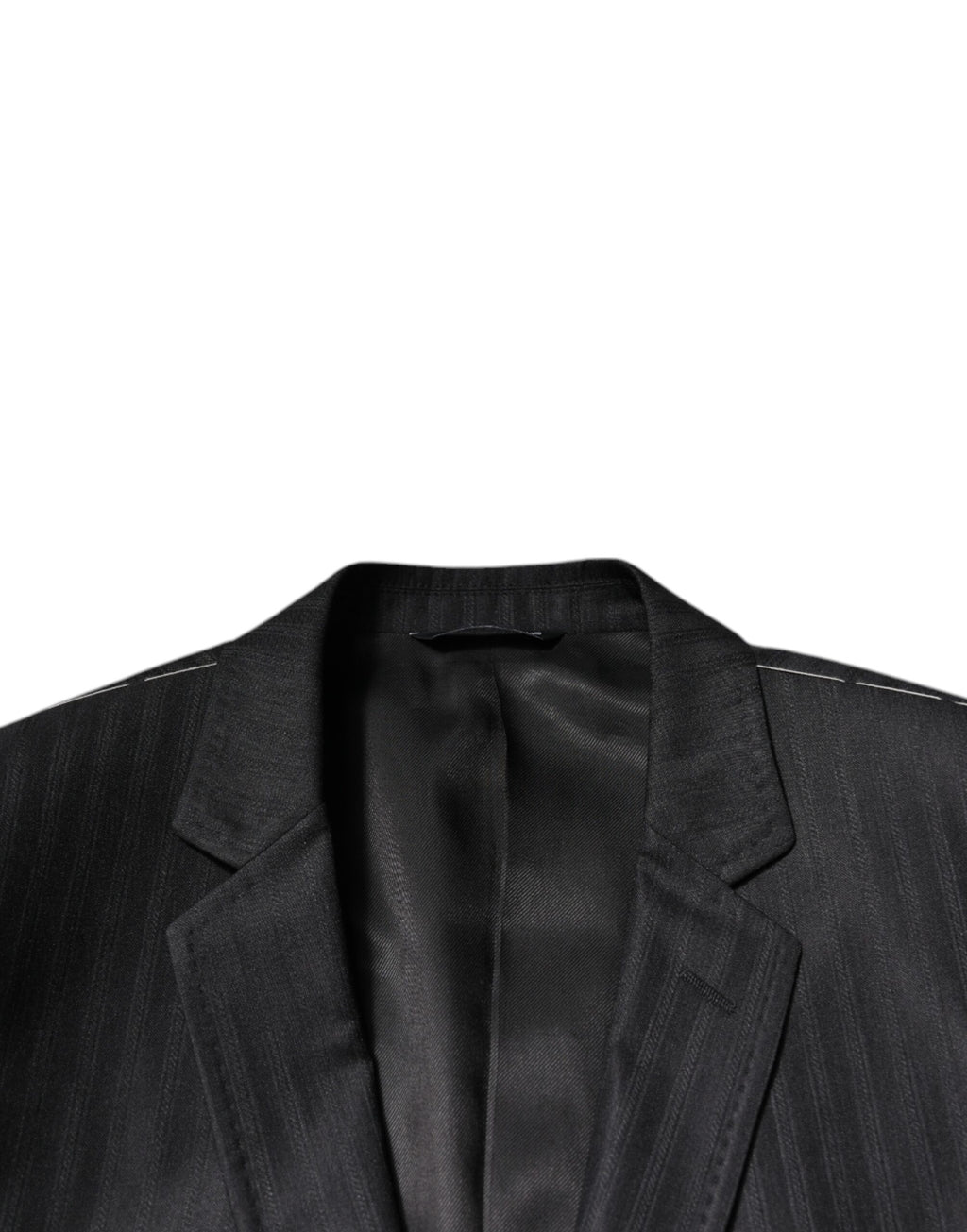Blazer en laine noir à rayures de Dolce & Gabbana, coupe simple boutonnage, porte-vent en image.