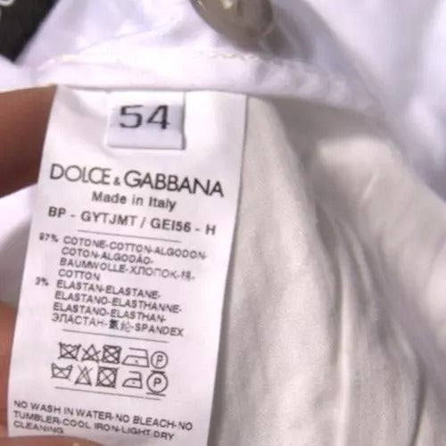 Shorts décontractés en coton stretch blanc Dolce & Gabbana, chinos élégants pour homme, vue frontale.