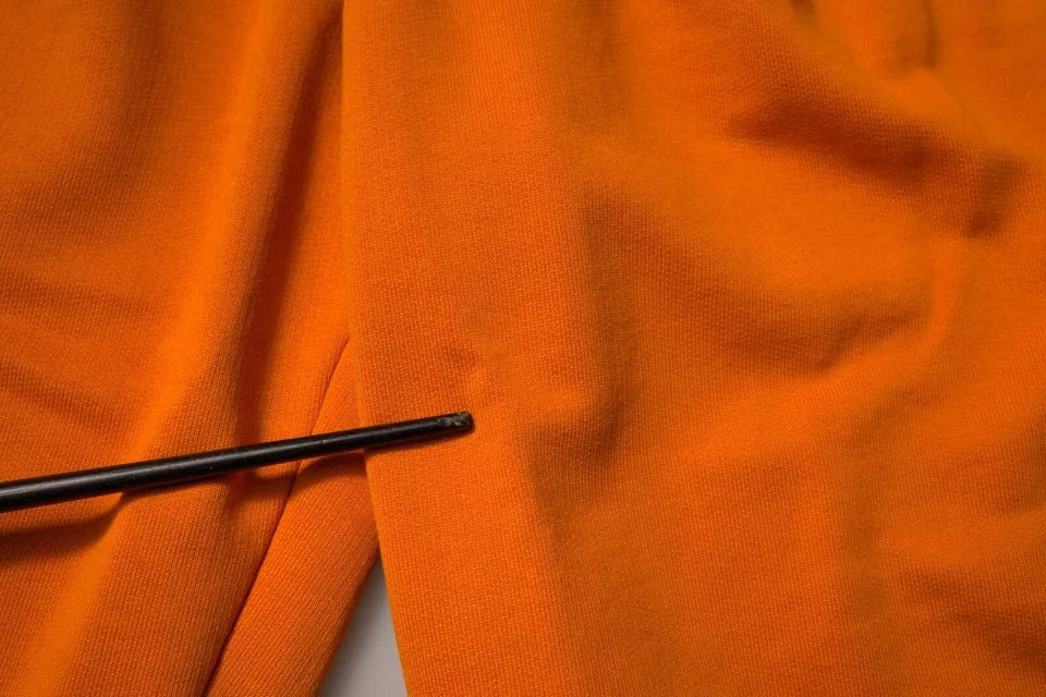Shorts cargo bermuda en coton orange pour homme Dolce & Gabbana, style décontracté et confortable.