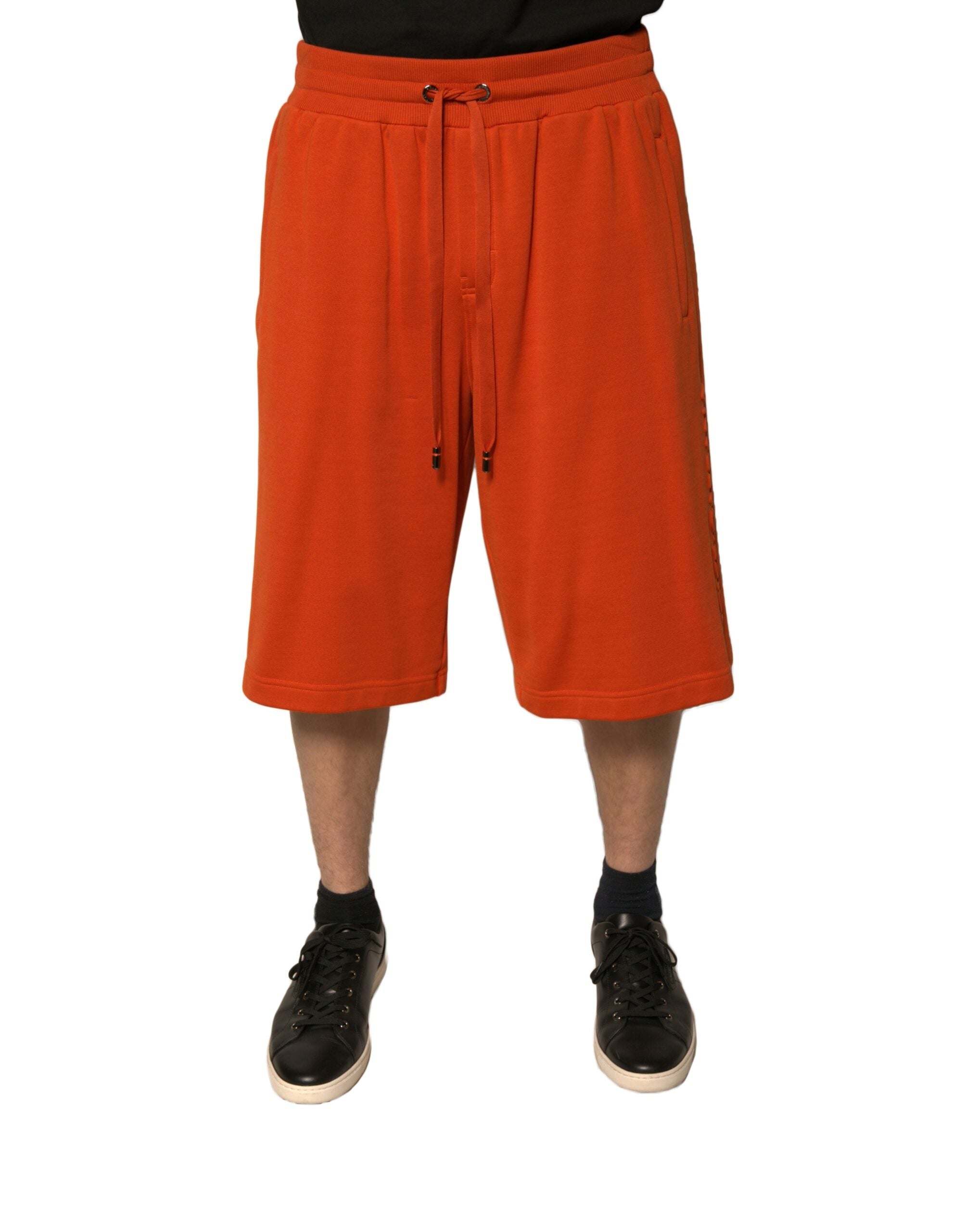 Shorts bermuda pour homme en coton mélangé orange de Dolce & Gabbana, style décontracté et élégant.