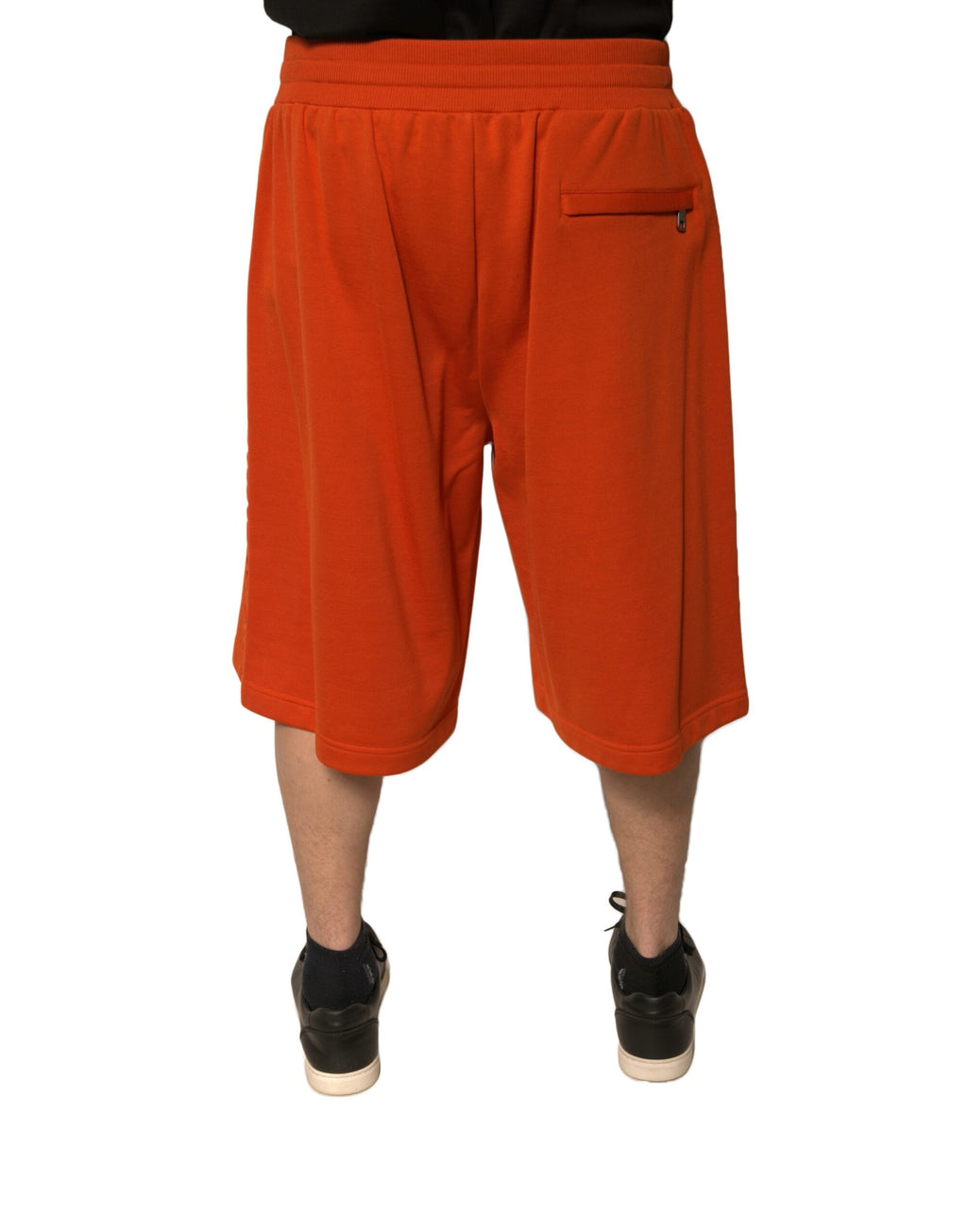 Shorts bermuda pour homme Dolce & Gabbana en coton mélangé orange, vue en gros plan.