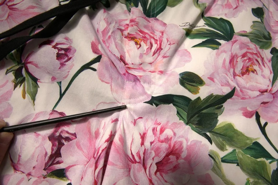 Shorts bermuda pour homme Dolce & Gabbana en coton à fleurs multicolores, style décontracté et élégant.