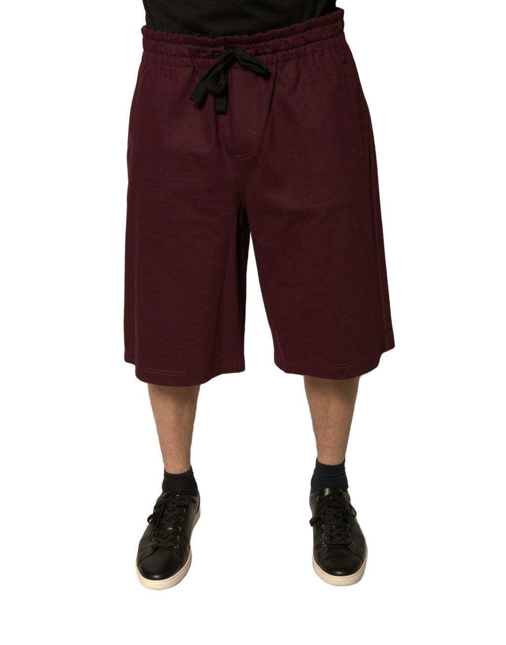 Shorts bermuda en coton marron foncé de Dolce & Gabbana, taille mi-haute, style décontracté et élégant.