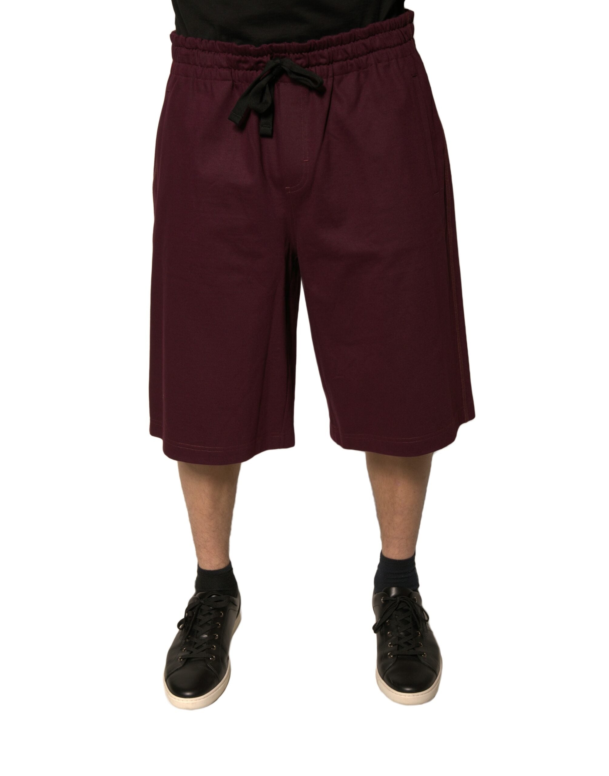 Shorts bermuda en coton marron foncé de Dolce & Gabbana, taille mi-haute, style décontracté et élégant.